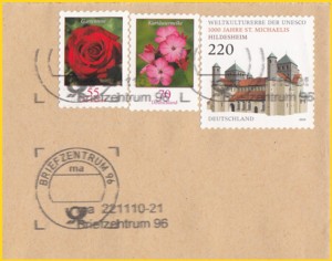 Briefausschnitt eines Großbriefes vom 22. November 2010 vom BZ 96, einem der wenigen BZ mit einer von zwei möglichen Übergangsvarianten bei der Entwertung vom kreisrunden Stempelbild auf die neue Frankierwelle - bei dieser Variante steht im kreisrunden Stempel sowohl Briefzentrum als auch die Nummer !